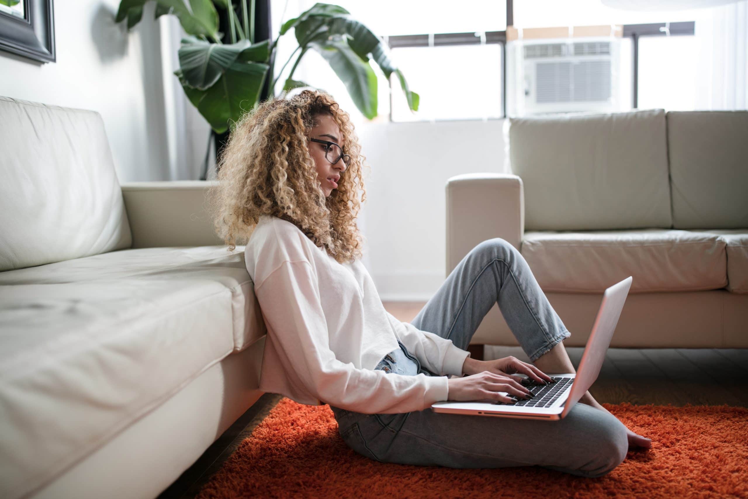 woman at home on laptop